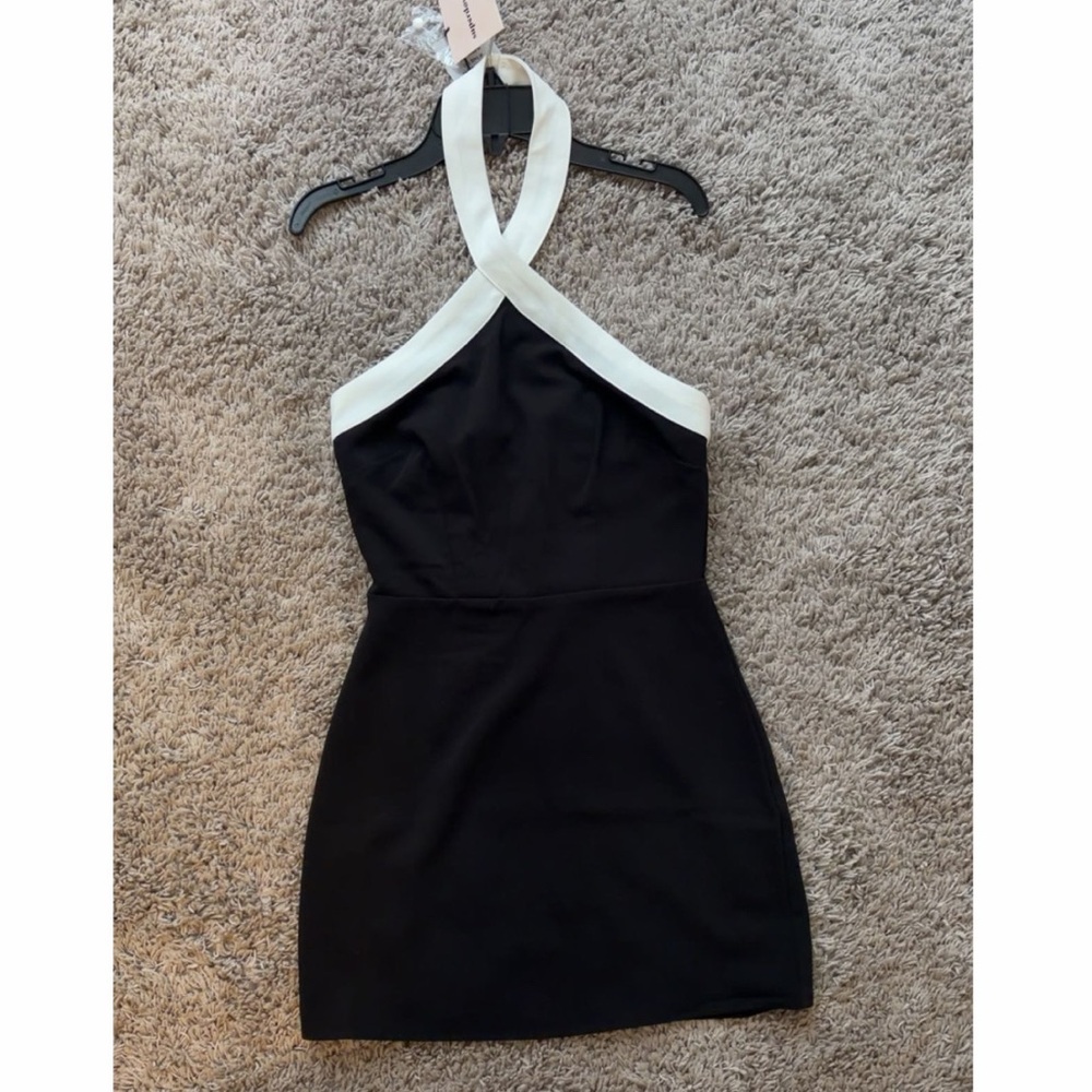 Women’s black Revolve Superdown mini dress with white halter